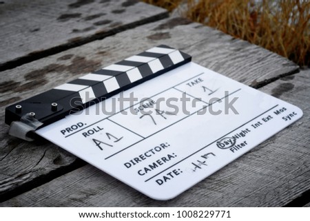directors clapboard on wooden walkway on stock photo edit now