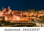 Diriyah illuminated  old town walls, At-Turaif district complex at night, Riyadh, Saudi Arabia