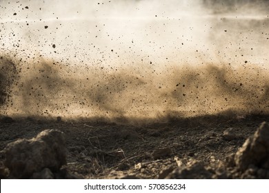 dirt fly after motocross roaring by - Shutterstock ID 570856234