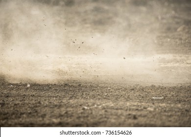 dirt fly after motocross roaring by - Shutterstock ID 736154626