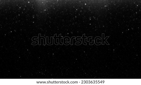 Dirt grey dust isolated on black background and texture, top view. Falling gray or white snow with black night winter sky on backdrop. 