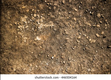 Dirt ground pebble road texture closeup