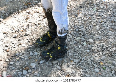 Dirt And Muddy Kid Shoes And Trousers 