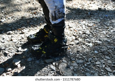 Dirt And Muddy Kid Shoes And Trousers