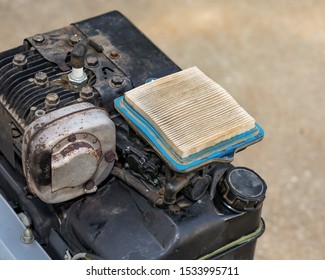 Dirty Air Filter On Small Gas Engine Of Garden Tiller. Concept Of Home Dyi Maintenance, Tune-up, And Repair