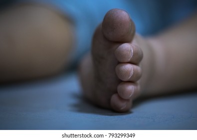 Dirty Baby Toes Tip On Blue Background