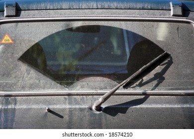 The Dirty Back Window Of An Automobile