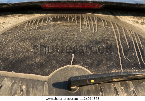 Dirty back window in\
car