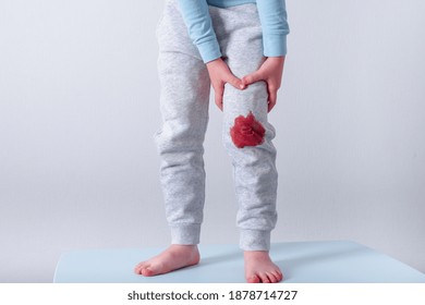 Dirty Blood Stain On Children's Clothes. Daily Life Dirty Stain For Wash And Clean Concept