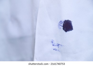 Dirty Blue Ink Stain On Bag Shirt  From Using Pen In Daily Life Activity. Dirty Stains For Cleaning Concept.