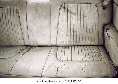 Dirty Broken Leather Back Seat Of Vintage American Car