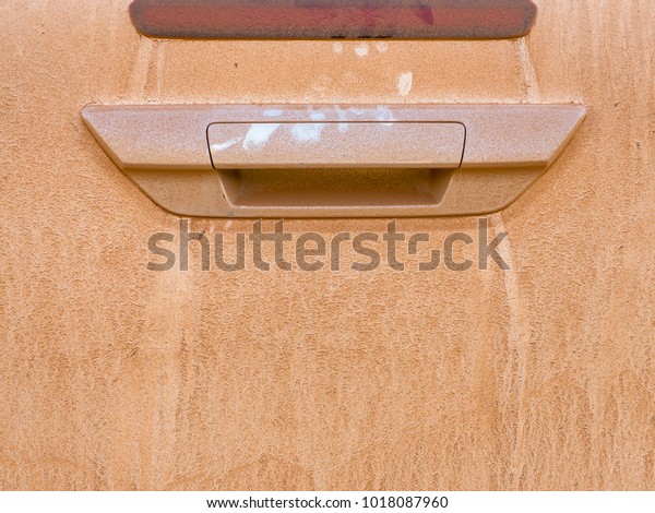 Dirty car door. Close up of dust on
the door car. Car care concepts. - Background texture.
