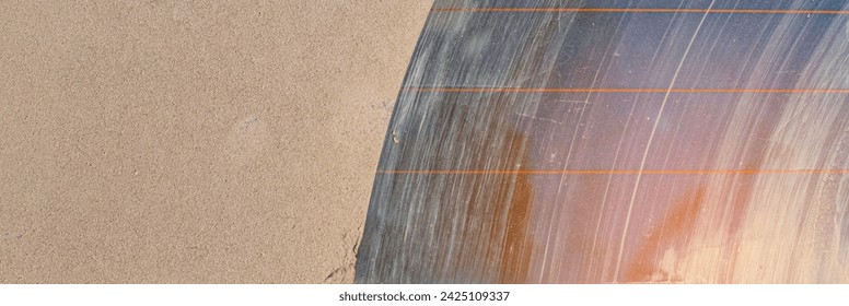 dirty car glass from the back in bad weather and limited visibility from a non-working windshield wiper at sunset, the front and back background are blurred with a bokeh effect - Powered by Shutterstock