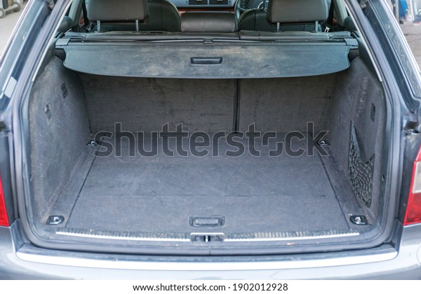 Dirty Carpet in Empty\
Car Trunk Interior