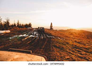 Dirty Cars And Wheels In The Mountains. Swamp On The Tires. Trips Offroad Across Ukraine. View Of The Carpathian Mountains Sunset