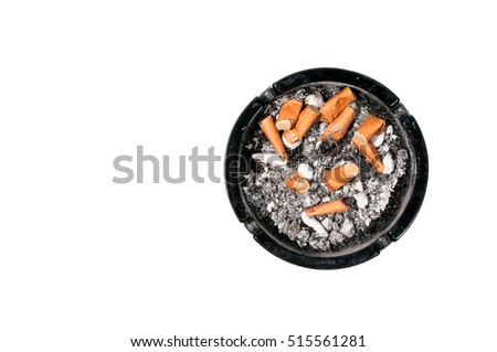 Dirty ceramic black ashtray full of cigarette butts Isolated on a white background view from above.