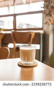 Dirty Coffee Glass On Table In Coffee Shop Cafe