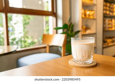 Dirty Coffee Glass On Table In Coffee Shop Cafe