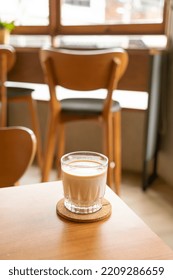 Dirty Coffee Glass On Table In Coffee Shop Cafe