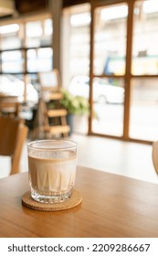 Dirty Coffee Glass On Table In Coffee Shop Cafe