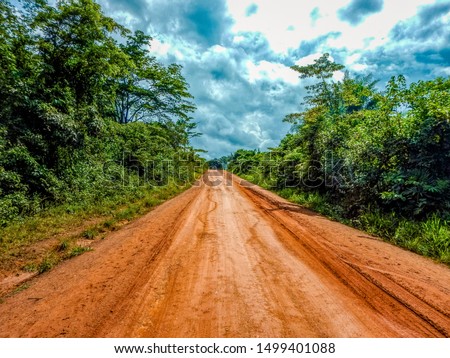 Dirty dirt road in Liberia after a tropical rain. West Africa