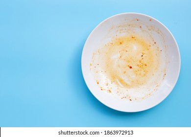 Dirty dish on blue background. Top view - Shutterstock ID 1863972913