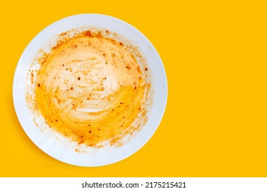 Dirty dish on yellow background. Top view - Shutterstock ID 2175215421