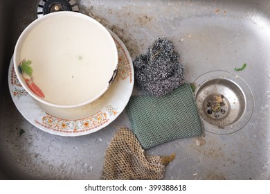 Dirty Dishes In Kitchen Sink Closeup