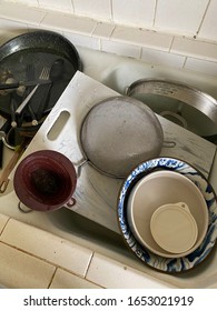 Dirty Dishes In Kitchen Sink - Shot From Overhead -