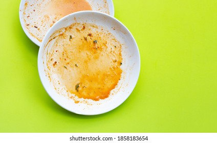 Dirty dishes on green background. Top view - Shutterstock ID 1858183654