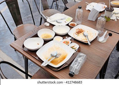 Dirty Dishes On A Table In A Restaurant