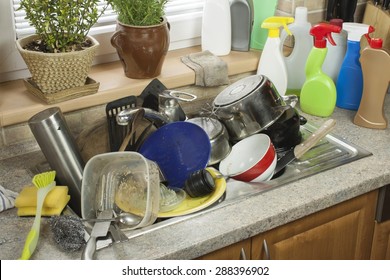 Dirty Dishes In The Sink After Family Celebrations. Home Cleaning The Kitchen.