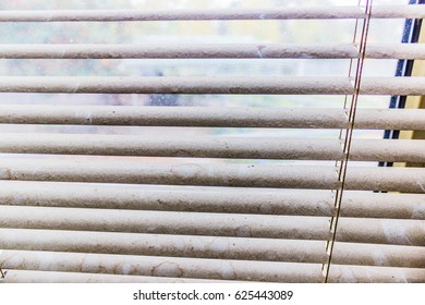 Dirty In Dust Spots Horizontal Blinds Close-up.