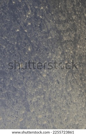 Dirty and dusty back car glass.  Abstract dusty glass texture background.