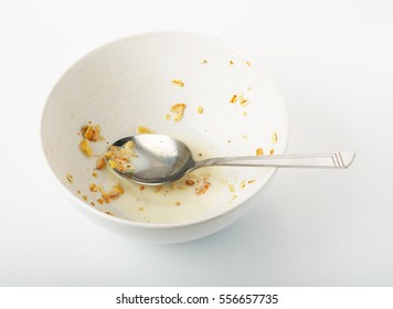 Dirty And Empty Cereals Bowl With Fork Spoon