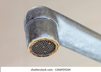 Dirty Faucet Aerator With Limescale, Calcified Shower Water Tap With Lime Scale In Bathroom, Close Up.