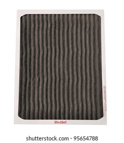 Dirty Furnace Filter On A White Background. Great Concept For Changing Your Filter Regularly