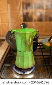 Dirty Geyser Coffee Maker Stands On A Dirty Stove