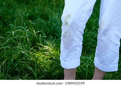 Dirty Grass Stains On Casual Clothes. Daily Life Dirty Stain For Wash And Clean Concept. High Quality Photo
