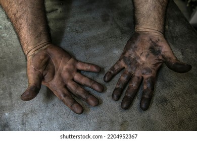 
Dirty Greasy Hands Of A Car Mechanic.