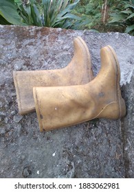 Dirty Gum Boot Of Farm Worker, Mountain Workwear Concept 