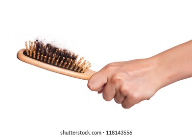 Dirty Hairbrush In Woman Hand Isolated On White Background