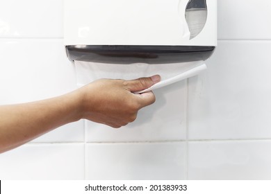 Dirty Hand Picking A Toilet Paper