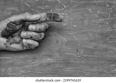 A Dirty Hand Pointing Forward, In Black And White