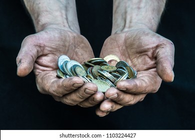 Dirty Hands Homeless Poor Man With Many Coins From Different Countries Illustrating Poverty In Modern Capitalism Society