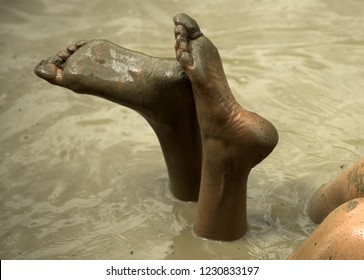 Dirty Heels And Feet. Legs Butt In Mud Bath. Woman In The Mud Bath. Spa Procedure And Body Care. Enjoying Mud