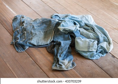 Dirty Jeans On Floor