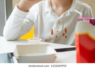 Dirty Ketchup Stains On White Clothes. Kids Eat Unhealthy Fat Food. Daily Life Stain Concept. High Quality Photo