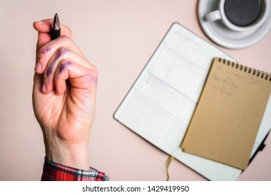 Dirty left hand after writing. Left hander day concept. Working place of lefty - Shutterstock ID 1429419950