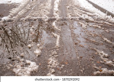 Dirty Melting Snow On The Road As A Background.